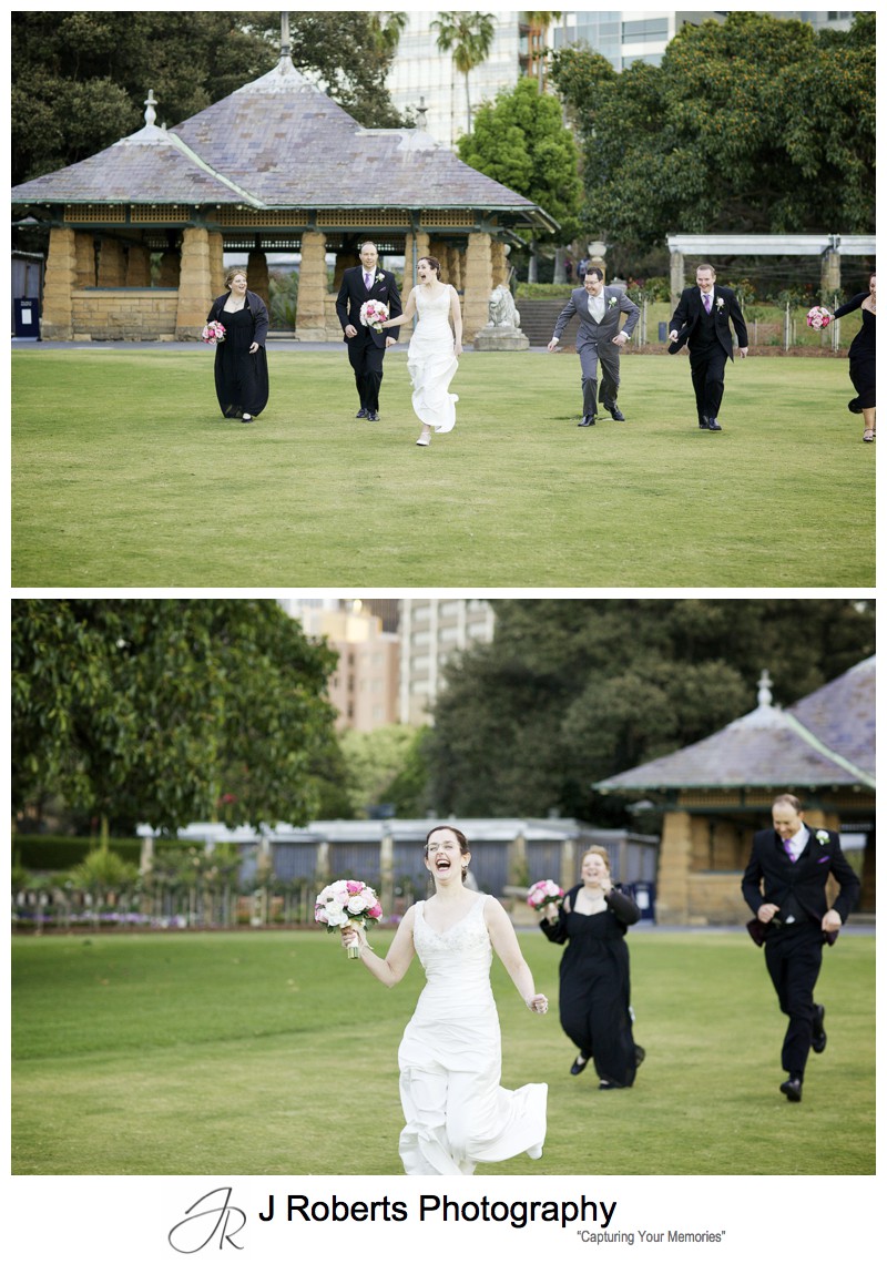 Bride winning a running race with the bridal party - Sydney wedding photography